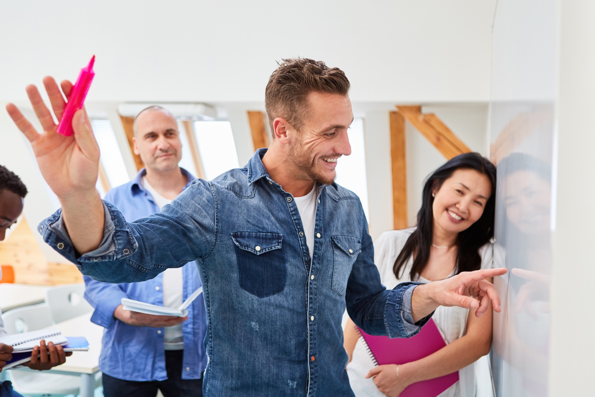 Man working with energy and passion alongside his team